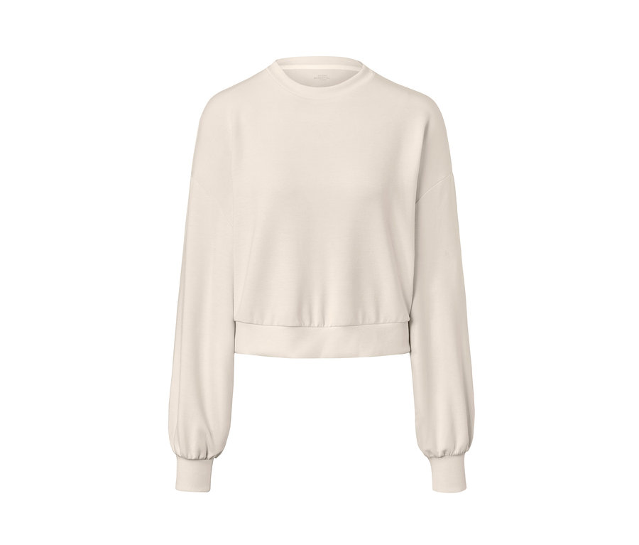 Un sweat-shirt beige très doux à manches longues.