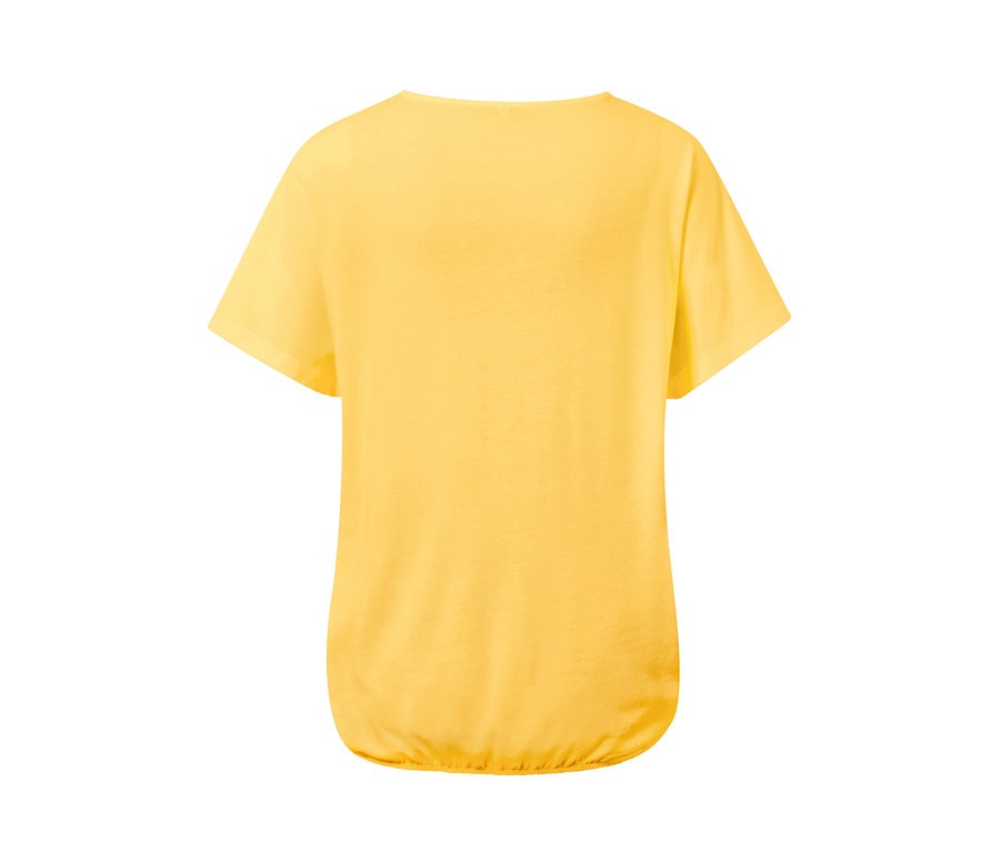 Blouse jaune à manches courtes avec broderie.