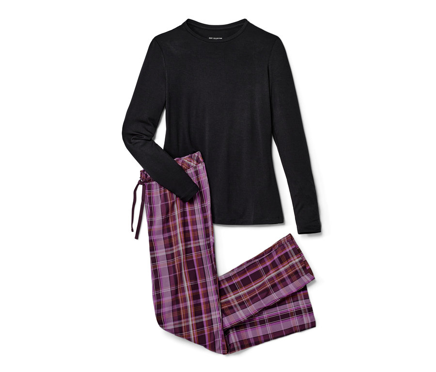 Un haut de pyjama noir à manches longues et un pantalon de pyjama tissé à carreaux.
