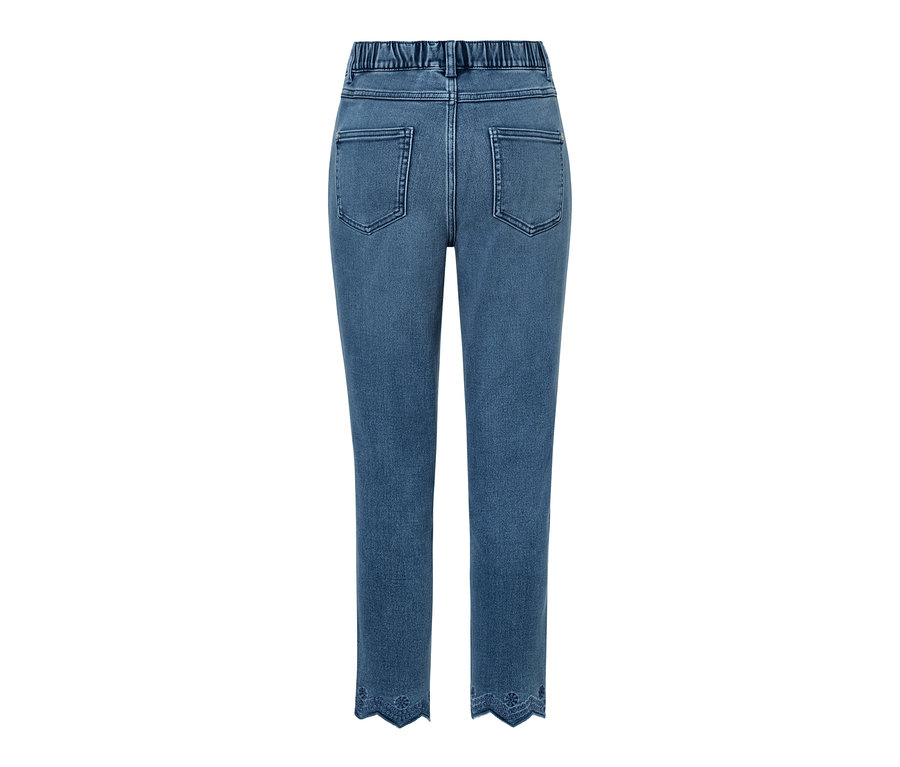 Tregging 7/8 bleu avec taille élastique et broderie ajourée décorative à l'ourlet.