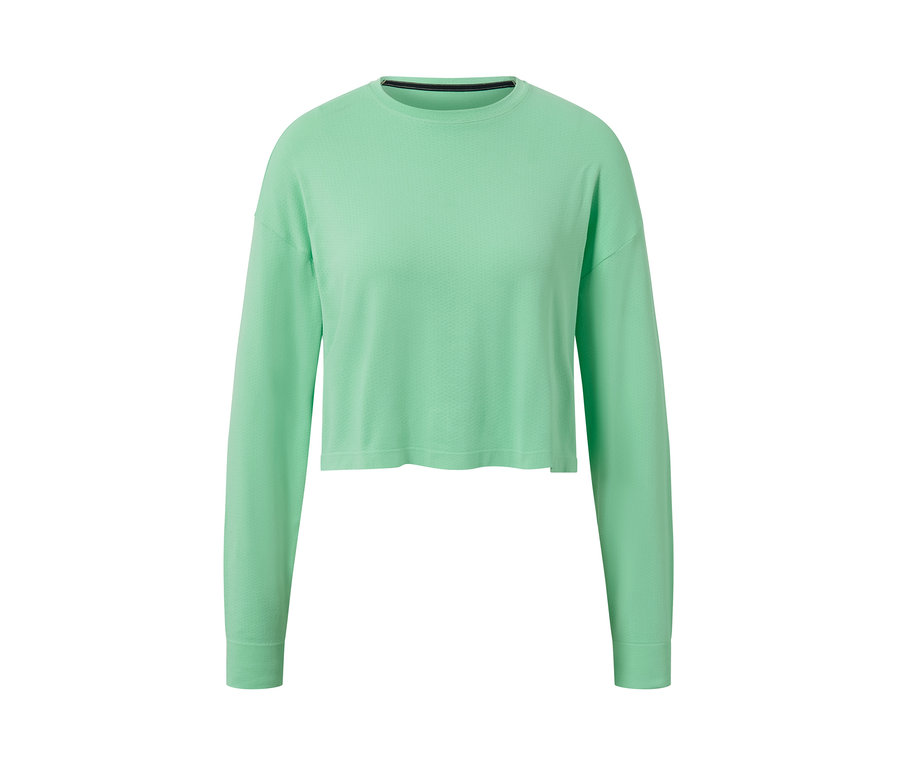 Un t-shirt fonctionnel sans coutures vert clair à manches longues sur fond blanc.