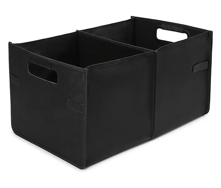 Organisateur en tissu noir avec deux compartiments et poignées.