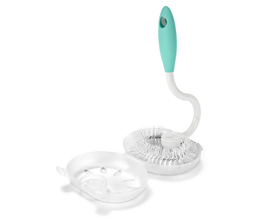 Goupillon à bouteille avec manche bleu-vert et poils blancs à côté d'un égouttoir transparent.