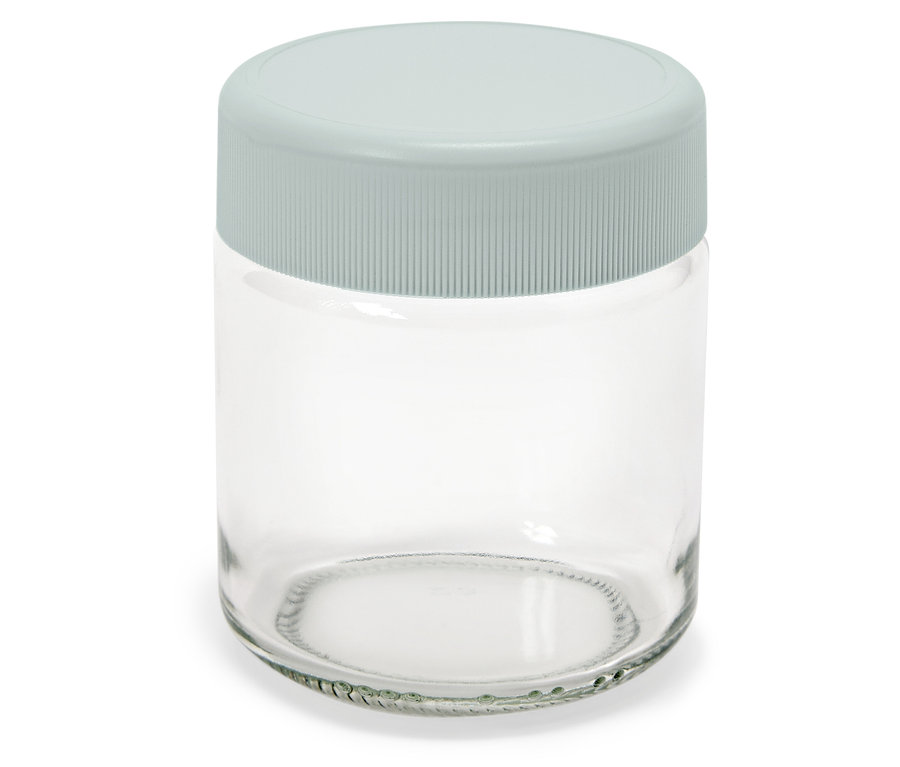 Récipient en verre vide avec couvercle gris.