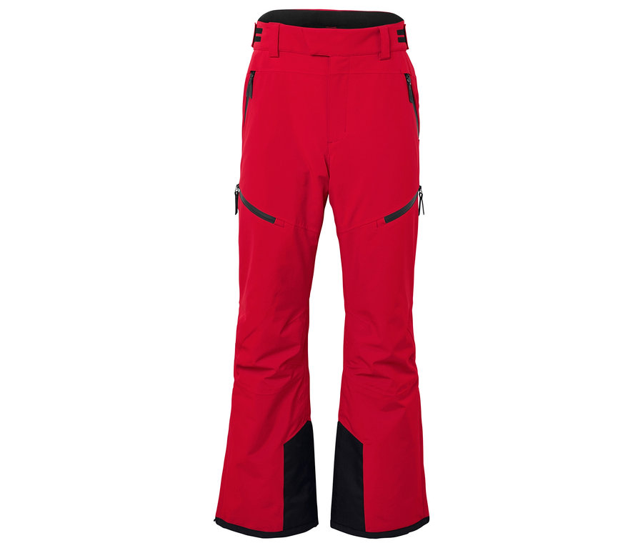 Un pantalon de ski rouge avec des détails noirs en bas des jambes.