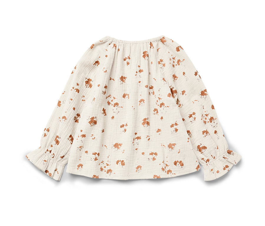 Blouse en mousseline pour enfant à manches longues et imprimé floral marron.