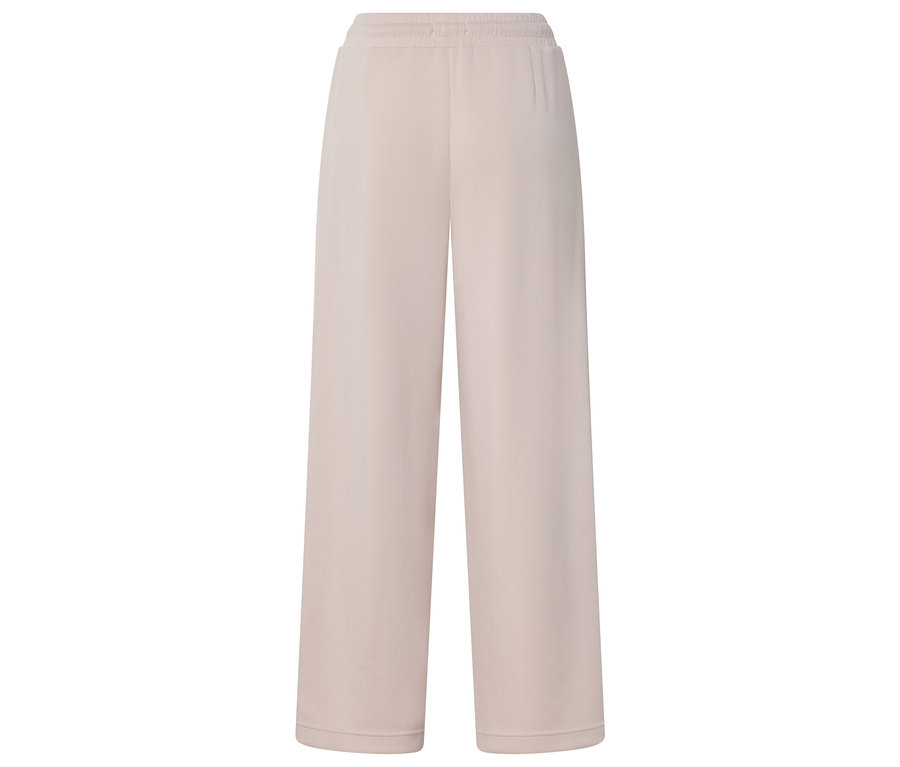 Pantalon large beige en tissu avec ceinture élastique.