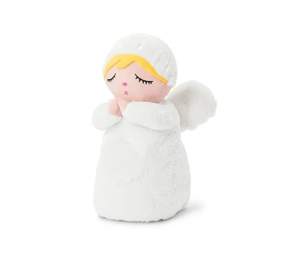 Ange en peluche blanc aux yeux fermés, aux cheveux jaunes et aux mains jointes.