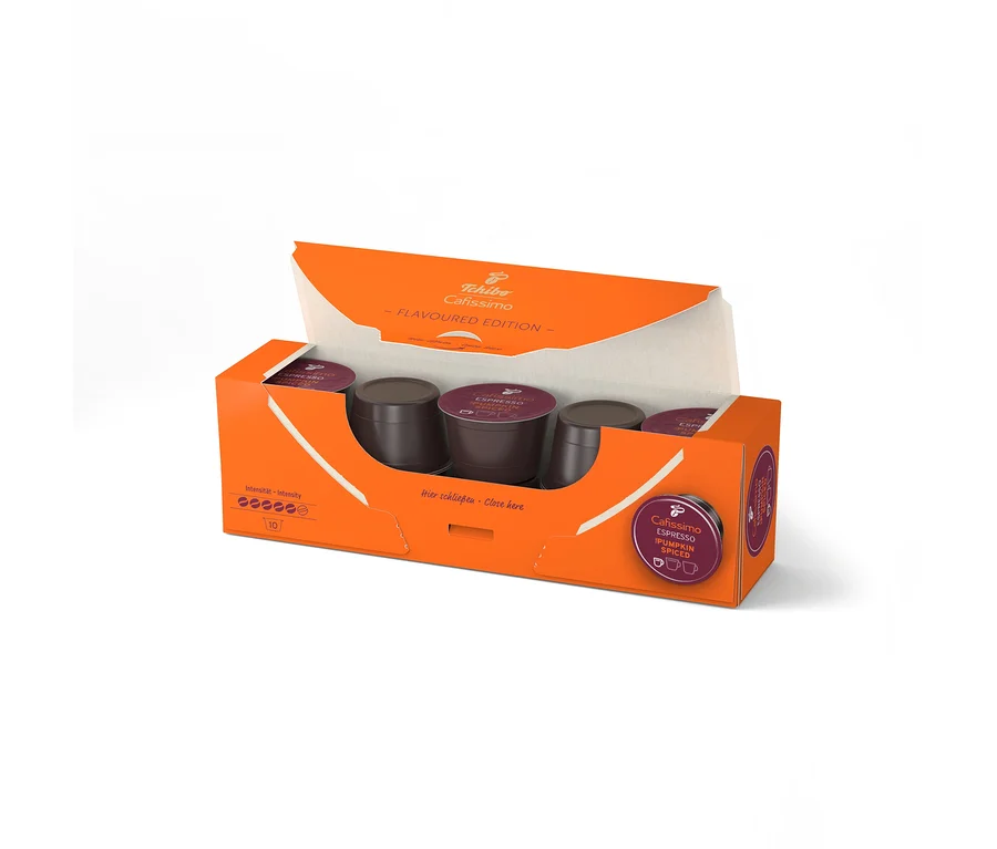 Une boîte orange ouverte contenant dix capsules violet foncé Cafissimo Flavoured Espresso - Pumpkin Spiced, disposées en deux rangées.