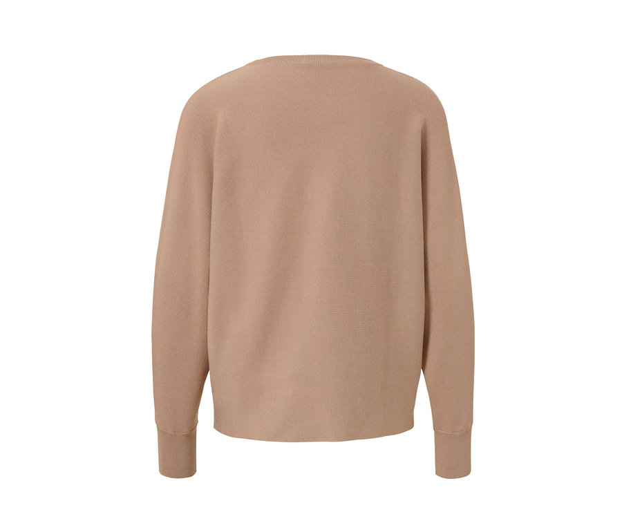 Pull en maille fine beige vu de dos.