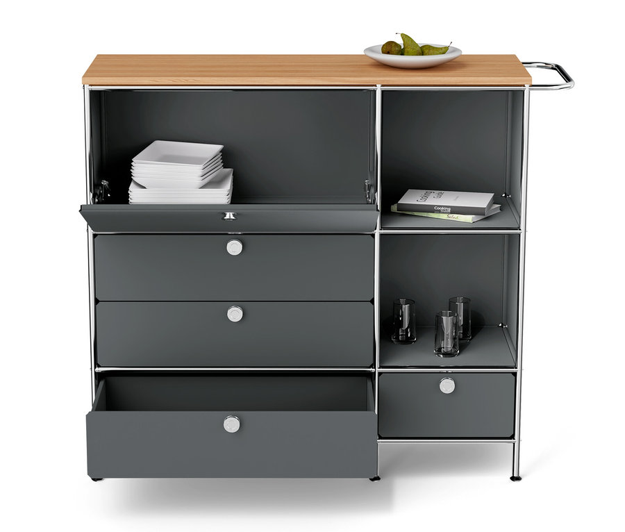 Meuble en métal « CN3 » gris avec plateau en bois, un abattant et quatre tiroirs.