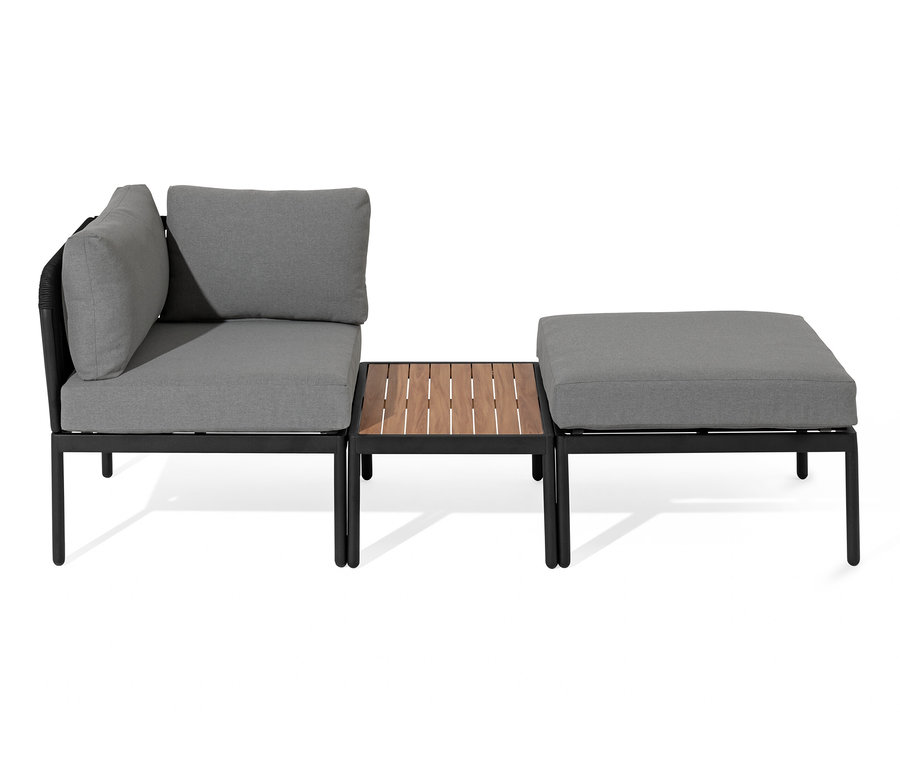 Lounge modulaire avec tressage textile et coussins gris.