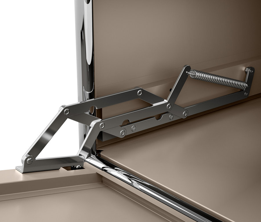 Gros plan sur une commode en métal « CN3 » taupe avec abattants et mécanisme d'ouverture.