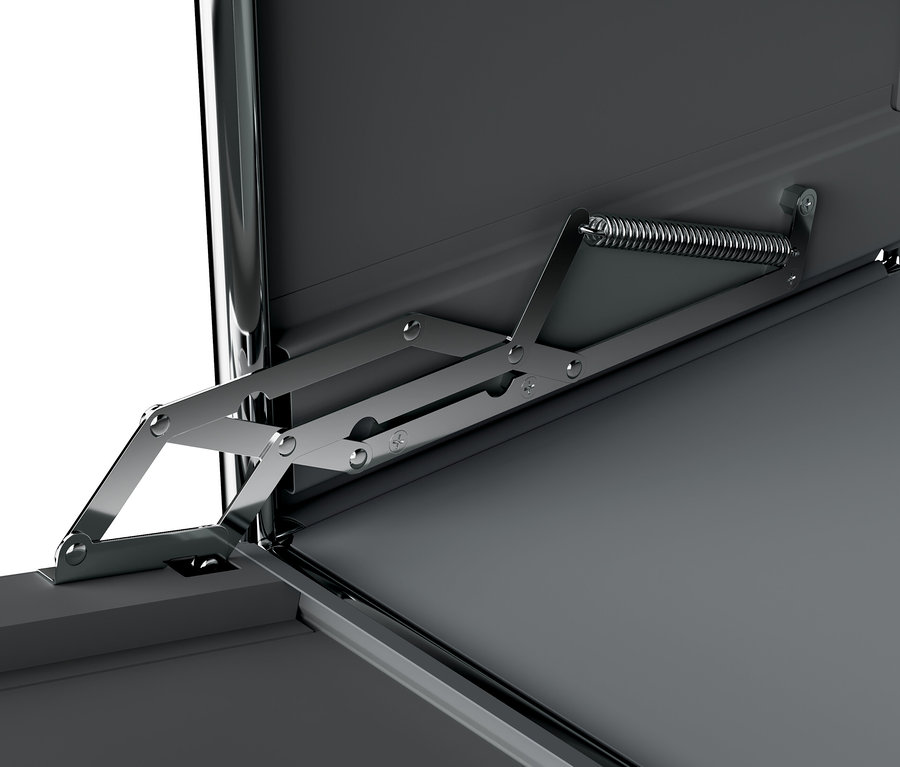 Détail d'une commode étroite en métal gris « CN3 » avec abattant et plateau en bois.