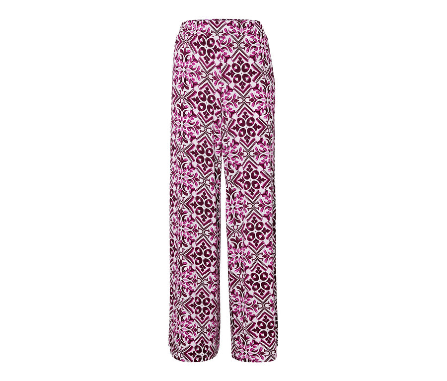 Un pantalon palazzo imprimé, couleur baie.