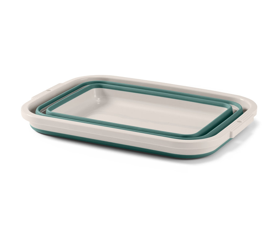 Une bassine à linge et à vaisselle pliable en blanc et vert.