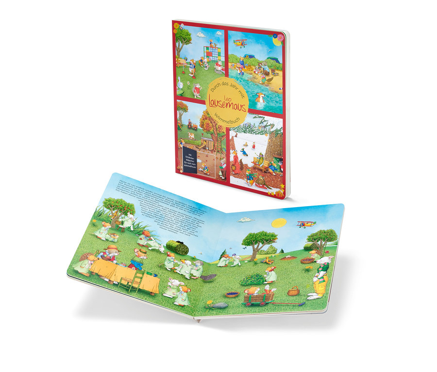 Un livre pour enfants ouvert, Wimmelbuch : Durch das Jahr mit Leo Lausemaus, présente des illustrations de souris dans un pré.