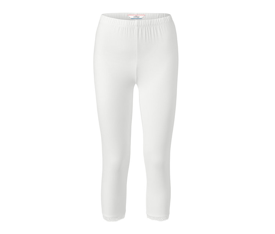 Legging court blanc avec bordure en dentelle.