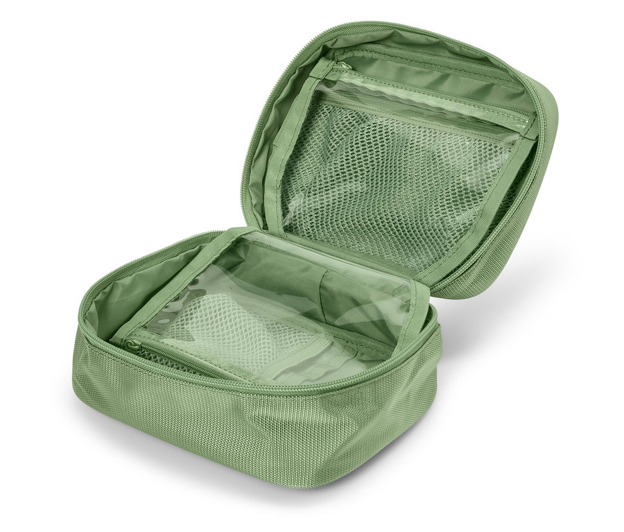 Trousse de toilette vert clair ouverte avec une poche en filet à l'intérieur.