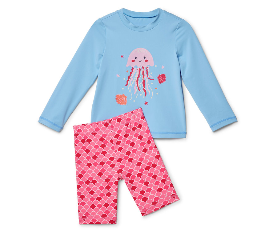 Un haut à manches longues bleu clair avec une méduse rose et un legging rose à écailles.