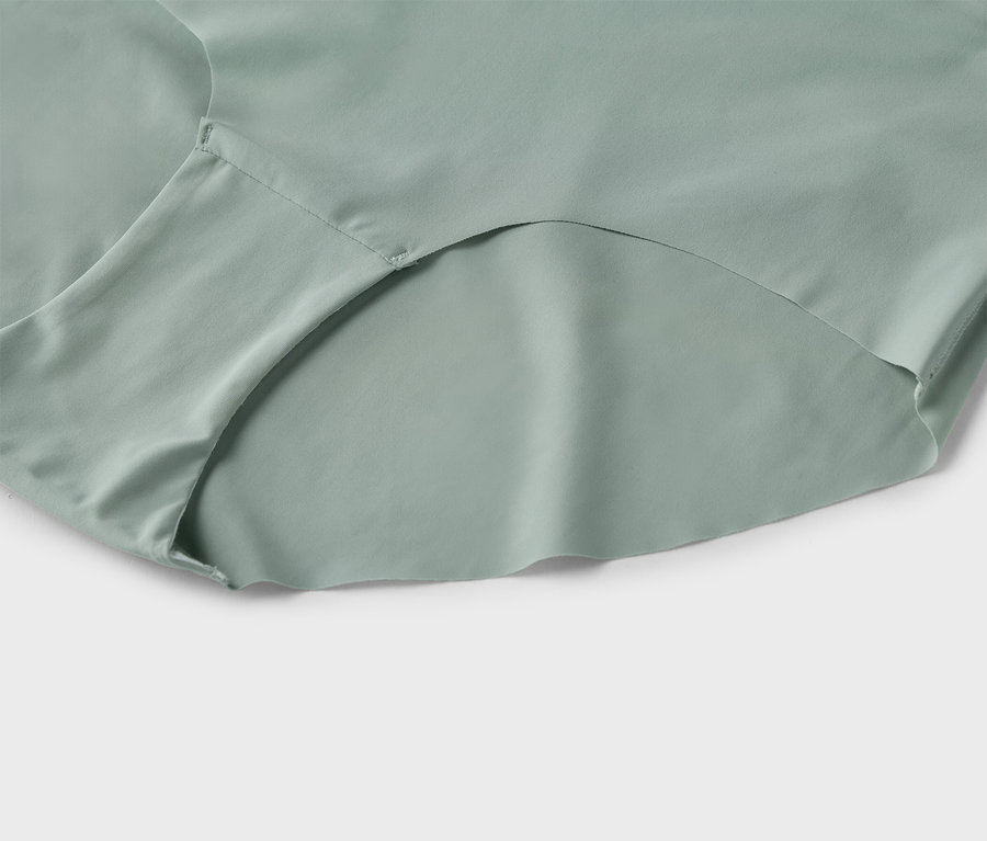 Gros plan d'un sous-vêtement unique de couleur vert clair.