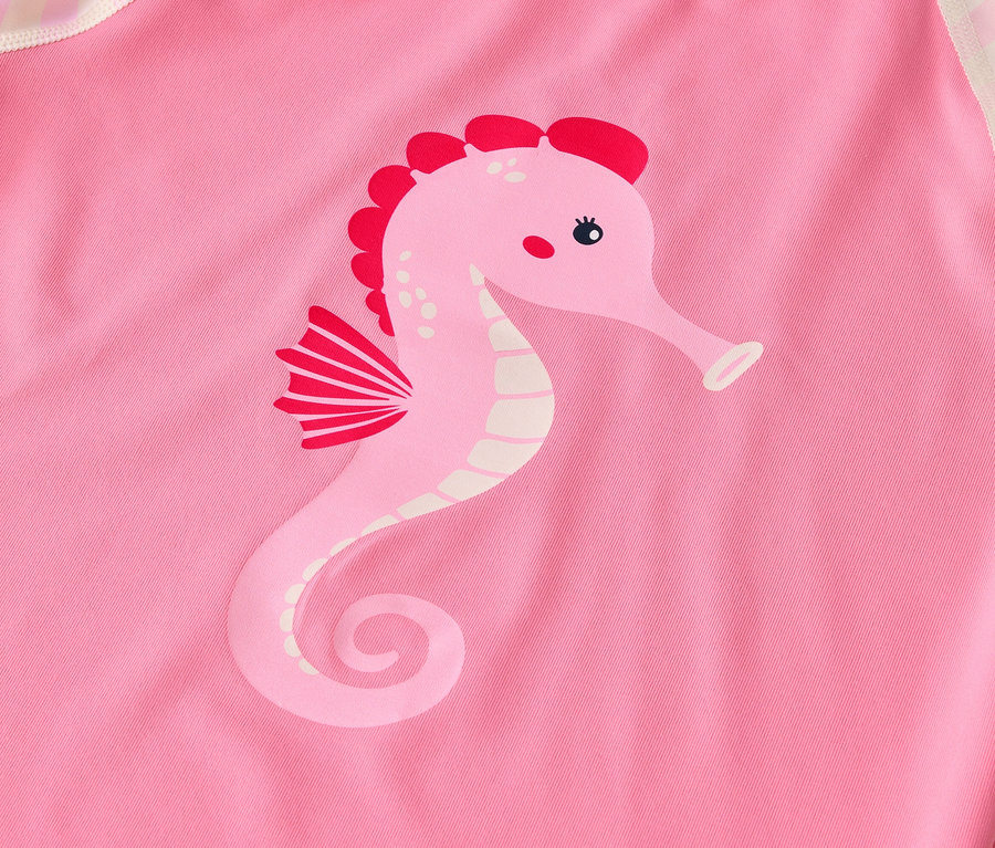 Maillot de bain rose avec motif hippocampe.