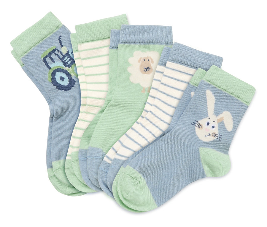 Cinq chaussettes sont superposées, avec des motifs tels qu'un tracteur, un mouton et un lapin.