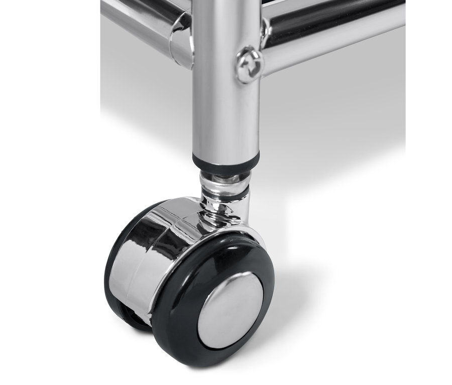 Gros plan sur une table d'appoint noire en métal « CN3 » avec tiroir, mettant en évidence une roulette.