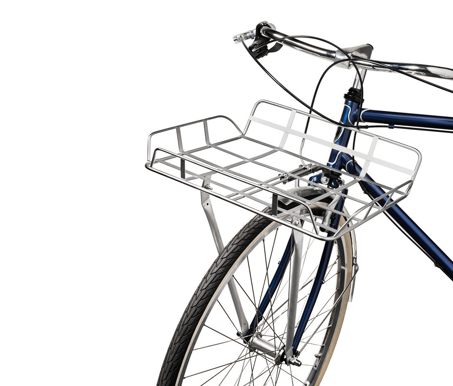 Porte-bagages pour roue avant de vélo monté sur un vélo bleu.