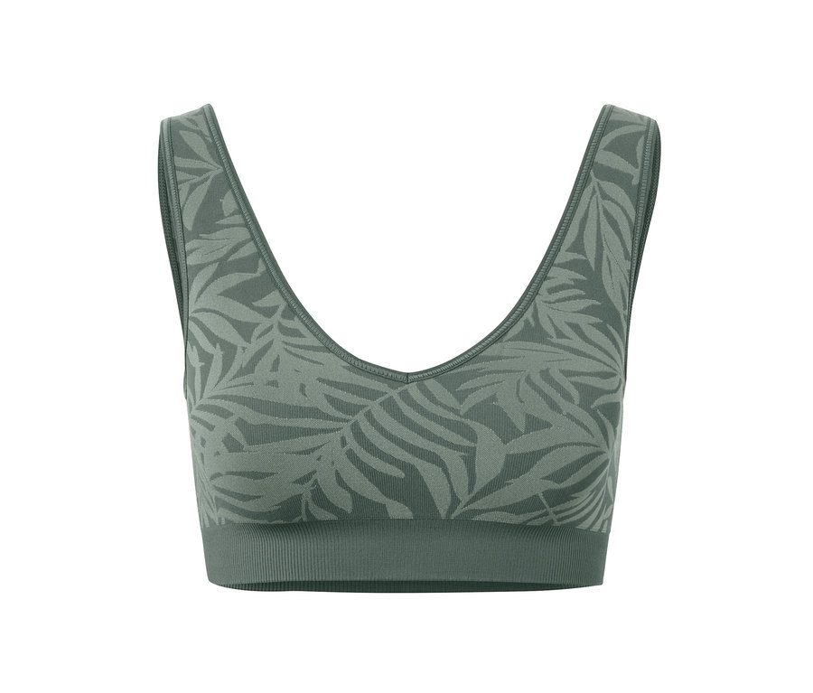 Gros plan d'une brassière de sport Seamless couleur sauge avec un motif de feuilles.