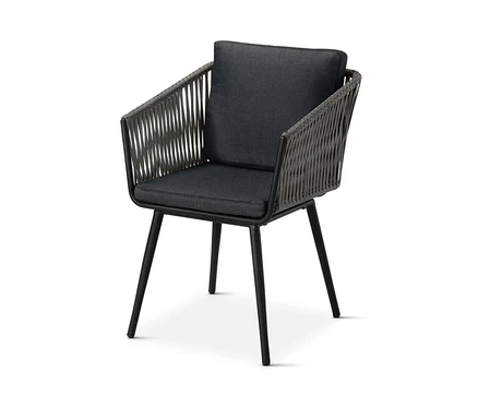 Fauteuil noir pour table à manger avec tressage textile et coussin.