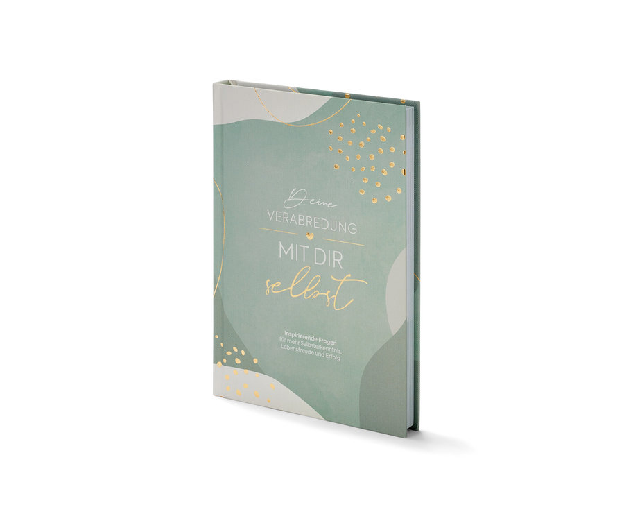 Le livre «
Deine Verabredung mit dir selbst
» posé sur une surface blanche.