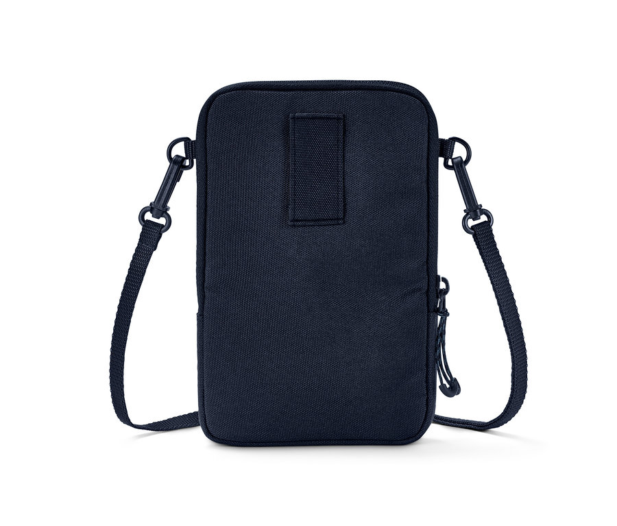 Détail d'un sac bandoulière bleu.