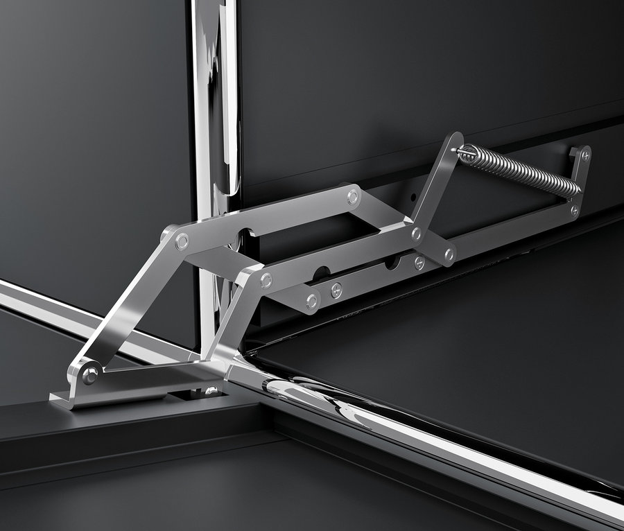 Détail d'un meuble en métal noir CN3 avec mécanisme d'ouverture chromé.