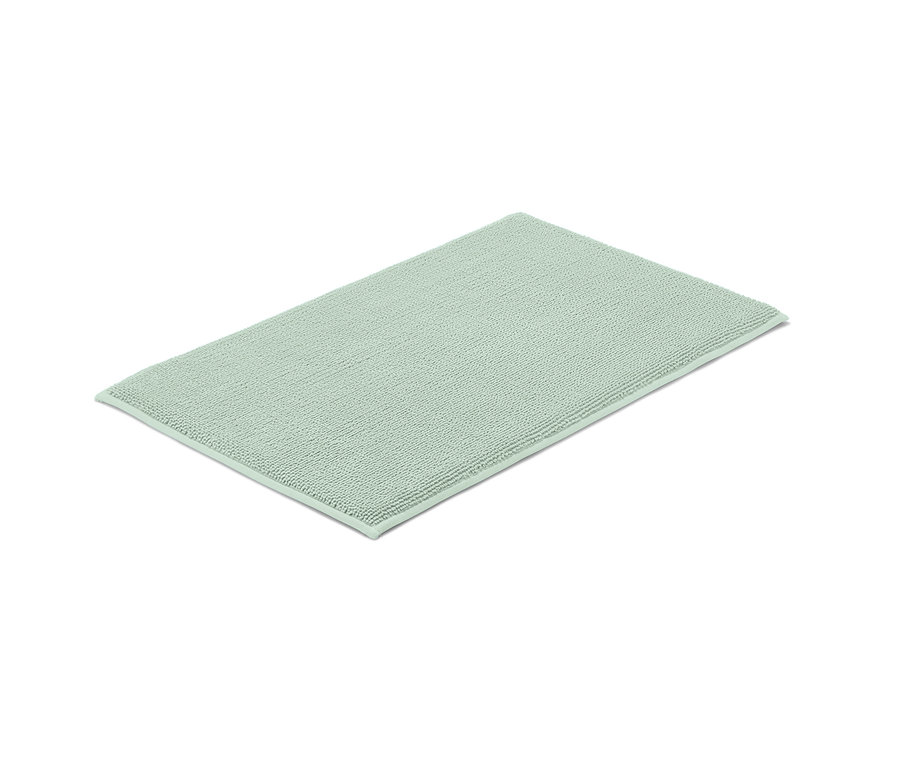 Un tapis de bain confortable vert clair de 40 x 70 cm.