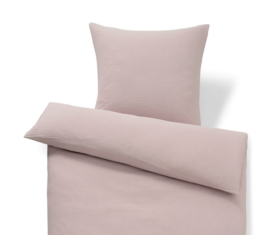 Parure de lit en mousseline rose de taille standard et grande taille.