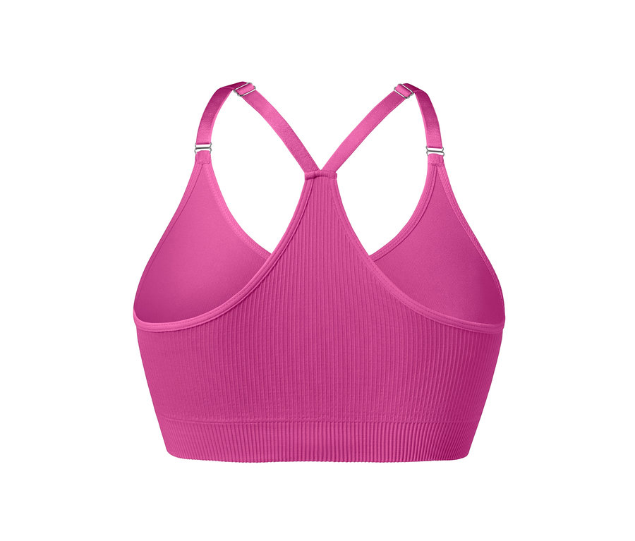 Gros plan d'une brassière de sport Seamless rose vif.