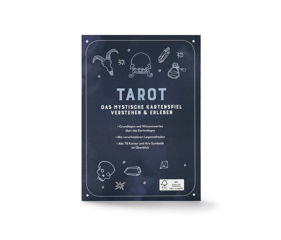 Tarot	: le kit pour débutants avec des cartes et un livre d’accompagnement avec des dessins de crâne, de cristal et d'étoile.