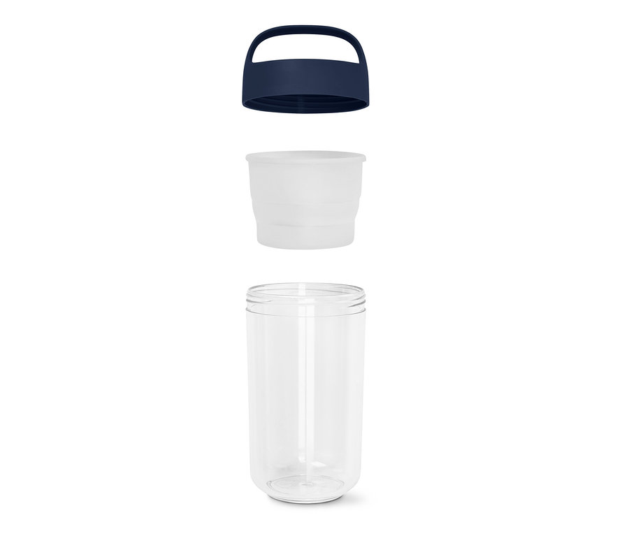 Un récipient en verre démonté avec un couvercle bleu et un intérieur blanc.