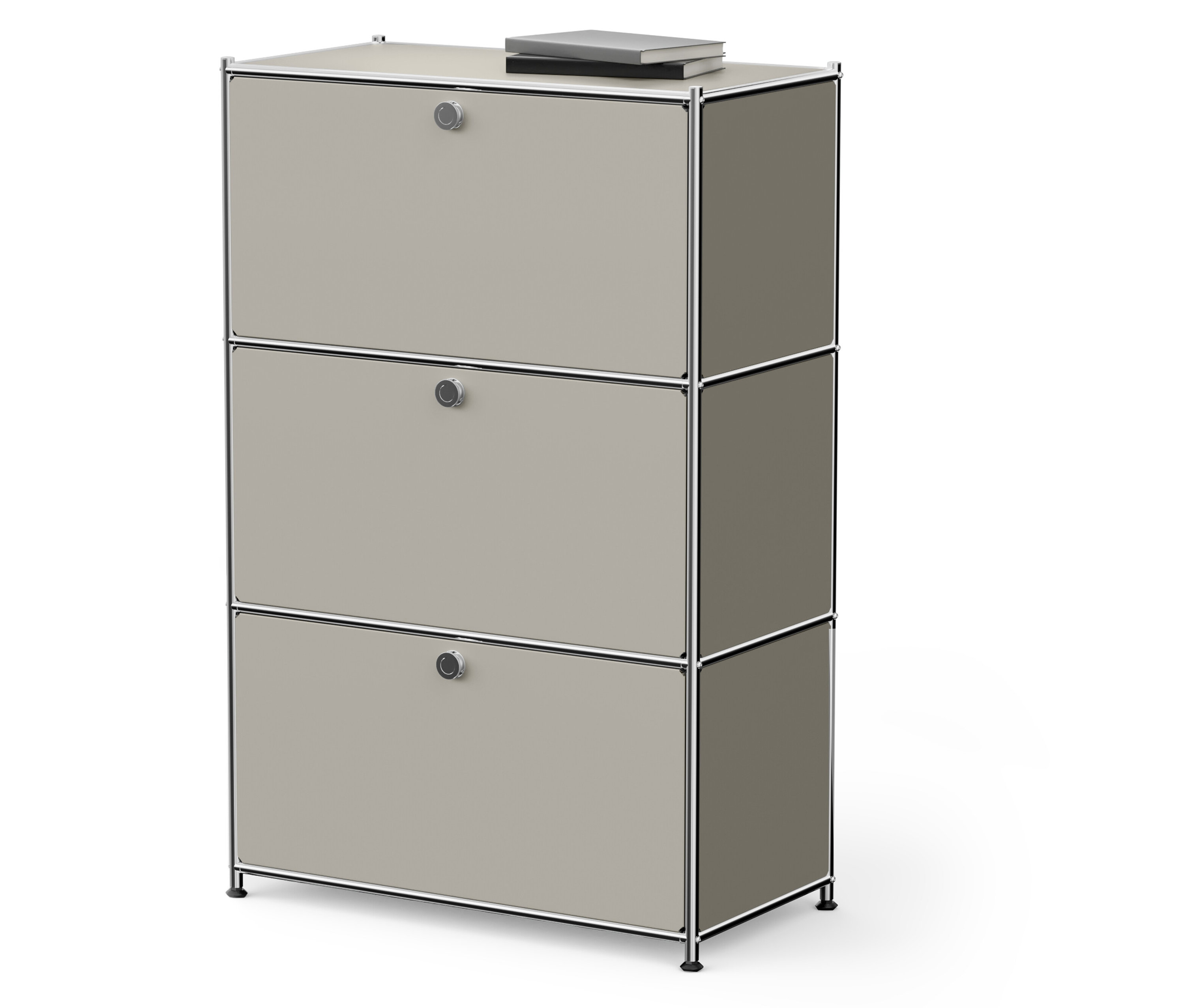 Une armoire beige à trois étages avec un livre sur le dessus.