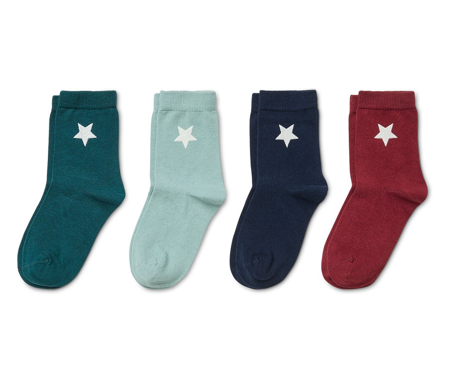Quatre paires de chaussettes avec étoile en vert, bleu-vert, bleu marine et rouge.