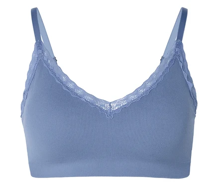 Soutien-gorge bleu à bretelles avec bordure en dentelle sur le décolleté.
