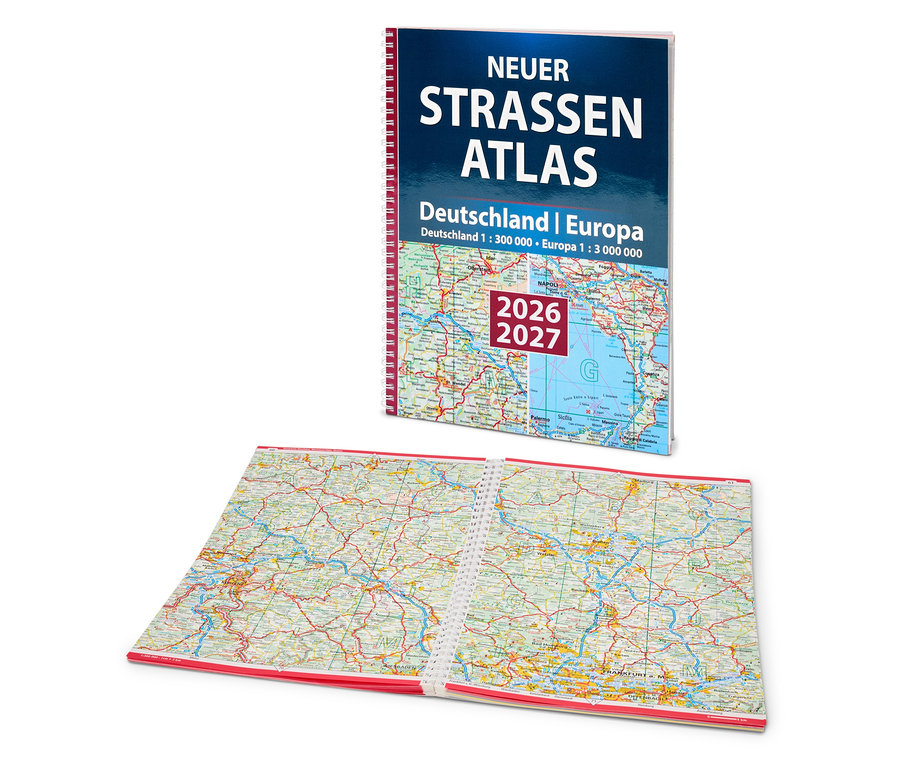Un nouvel atlas routier Allemagne | Europe est posé ouvert sur une table.