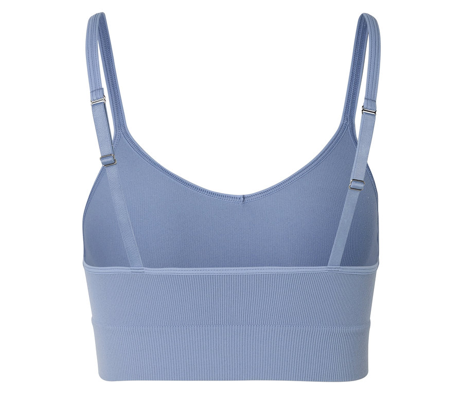 Vue arrière d'un soutien-gorge de sport bleu clair avec bretelles réglables et bande inférieure côtelée.