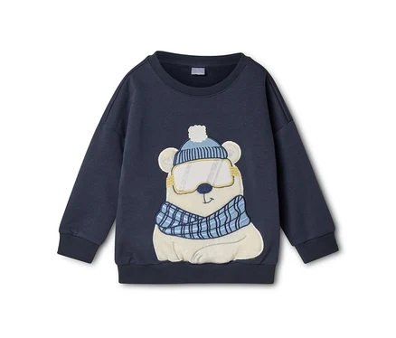 Sweat-shirt bleu marine avec un motif d'ours polaire blanc portant un bonnet bleu clair, des lunettes de ski jaunes et une écharpe à carreaux bleue.