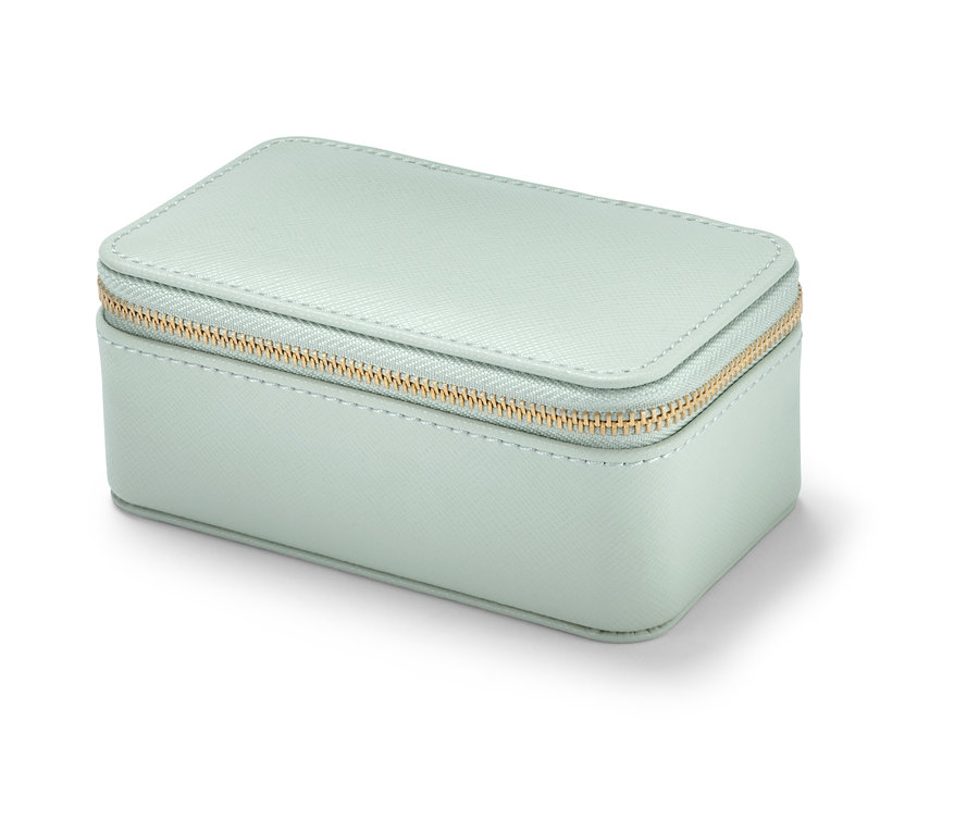 Petite boîte à bijoux vert clair avec une fermeture éclair dorée.