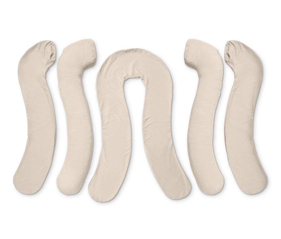Cinq coussins multifonctionnels XXL beiges disposés côte à côte.