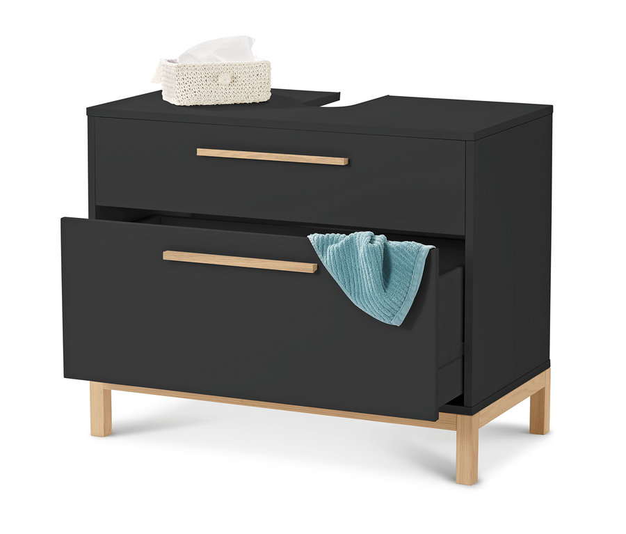 Meuble sous vasque « Eklund » anthracite à 2 tiroirs, avec une serviette bleue dans un tiroir ouvert. Une boîte de mouchoirs est posée sur le meuble.