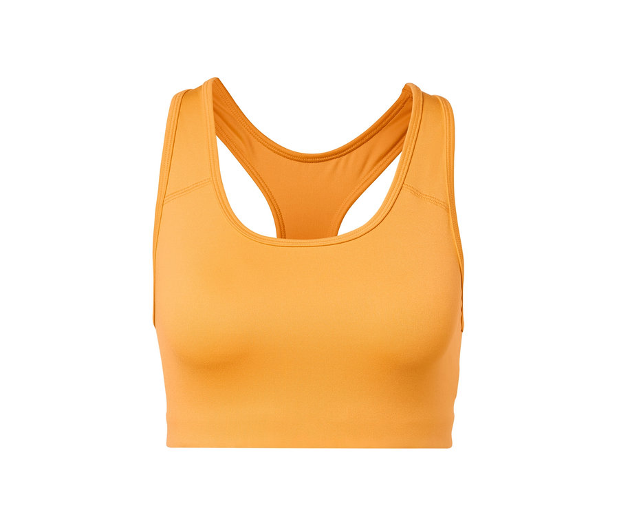 Soutien-gorge de sport orange d'un ensemble deux pièces sur fond blanc.