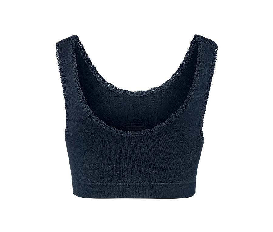 Détail d'une brassière sans coutures bleu foncé avec bordure en dentelle.